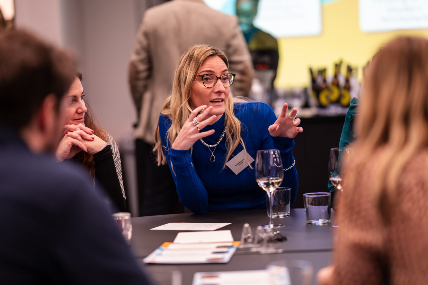 Delegates in discussion at a conference